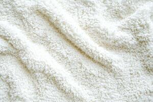 Soft and absorbent white terrycloth texture with tiny loops and a plush feel photo