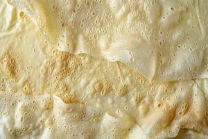 A crepe texture background features a distinctive, crinkled surface with a subtly uneven feel photo
