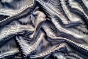 A plisse texture background features a crinkled, puckered surface with subtle, wavy ridges photo
