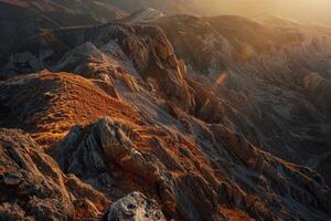 The mountains are covered in trees and rocks, and the sky is cloudy photo