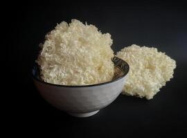 Dried snow fungus in a white bowl photo