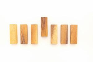 Top view of empty wooden blocks isolated on a white background. Concept of planning, strategy, and risk and in business. Space for text photo
