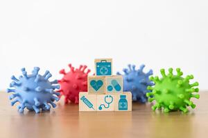 Healthcare. medical icon on wooden cube block stack on background with copy space, vaccination, laboratory, virus prevention, health, medical technology and insurance concept photo
