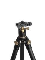 Small modern lightweight carbon tripod. Foldable tripod for photo and cameras. Isolate on a white back.