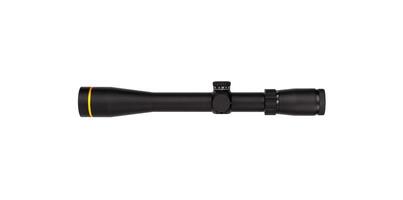 Modern sniper scope on a white back. Optical device for aiming and shooting at long distances. photo