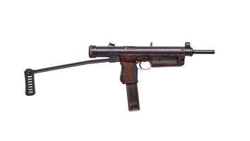 Vintage submachine gun isolate on white background. Weapons for the army and special forces of the past. Short automatic submachine gun. photo