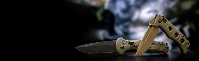 Khaki military pocket folding knives. Compact metal sharp knife with a folding blade. Blurred back. photo
