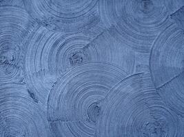 Textured plaster in the form of intersecting circles. Wall decoration. Background for various inscriptions photo