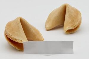 Chinese Fortune Cookies with blank paper for prediction message. photo