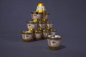 set of teacup. Against the grey background. Front view, copy space photo
