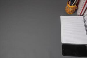 Workplace on isolated gray background with empty space photo