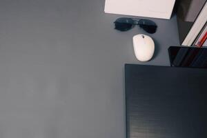 Workplace on isolated gray background with empty space photo
