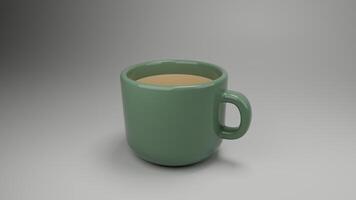 a green coffee cup on a gray surface photo