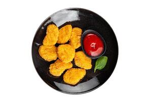 nuggets chicken meat deep fried fresh meal food snack on the table copy space food background rustic top view photo