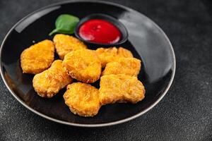 nuggets chicken meat deep fried fresh meal food snack on the table copy space food background rustic top view photo
