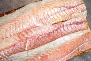 fillet raw white fish cod or halibut fresh meal food snack on the table copy space food background rustic top view photo