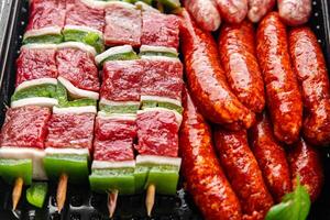 sausage meat assorted juicy pork, beef fresh delicious gourmet food background on the table rustick food top view copy space photo