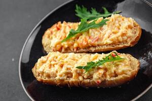 smorrebrod salad spread surimi and crab sticks, mayonnaise fresh meal food snack on the table copy space food background rustic top view photo