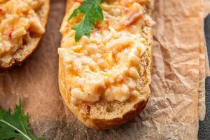 smorrebrod salad spread surimi and crab sticks, mayonnaise fresh meal food snack on the table copy space food background rustic top view photo