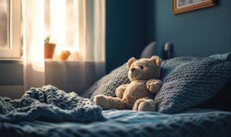 Plush bear nestled in pillows, cozy knitted blanket, soft blue walls photo