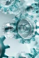 Transparent light cyan glass gears in motion, showcasing intricate details and modern design. Perfect for concepts related to engineering, precision, and technology photo