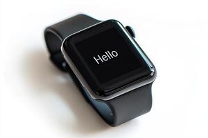 Close up of black smartwatch with word Hello photo