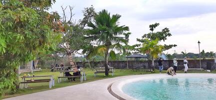 Beautiful view of The Danau Resort and Villa or Bebek Tepi Sawah famous Restaurant cabang Ubud Bali in Makassar - Gowa. South Sulawesi, Indonesia - August 7 2024 photo