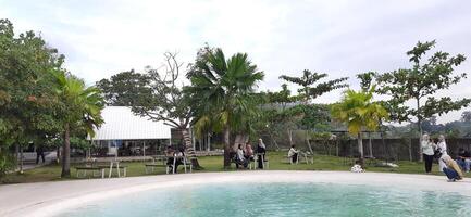 Beautiful view of The Danau Resort and Villa or Bebek Tepi Sawah famous Restaurant cabang Ubud Bali in Makassar - Gowa. South Sulawesi, Indonesia - August 7 2024 photo