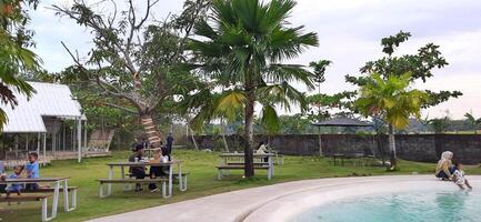 Beautiful view of The Danau Resort and Villa or Bebek Tepi Sawah famous Restaurant cabang Ubud Bali in Makassar - Gowa. South Sulawesi, Indonesia - August 7 2024 photo
