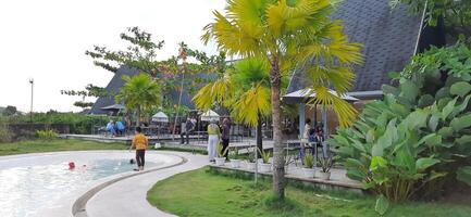 Beautiful view of The Danau Resort and Villa or Bebek Tepi Sawah famous Restaurant cabang Ubud Bali in Makassar - Gowa. South Sulawesi, Indonesia - August 7 2024 photo
