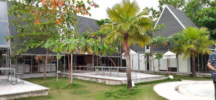 Beautiful view of The Danau Resort and Villa or Bebek Tepi Sawah famous Restaurant cabang Ubud Bali in Makassar - Gowa. South Sulawesi, Indonesia - August 7 2024 photo
