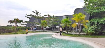 Beautiful view of The Danau Resort and Villa or Bebek Tepi Sawah famous Restaurant cabang Ubud Bali in Makassar - Gowa. South Sulawesi, Indonesia - August 7 2024 photo