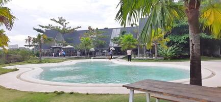 Beautiful view of The Danau Resort and Villa or Bebek Tepi Sawah famous Restaurant cabang Ubud Bali in Makassar - Gowa. South Sulawesi, Indonesia - August 7 2024 photo