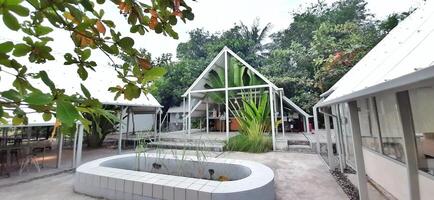 Beautiful view of The Danau Resort and Villa or Bebek Tepi Sawah famous Restaurant cabang Ubud Bali in Makassar - Gowa. South Sulawesi, Indonesia - August 7 2024 photo