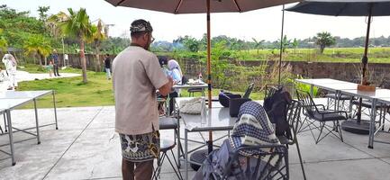 Beautiful view of The Danau Resort and Villa or Bebek Tepi Sawah famous Restaurant cabang Ubud Bali in Makassar - Gowa. South Sulawesi, Indonesia - August 7 2024 photo