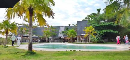 Beautiful view of The Danau Resort and Villa or Bebek Tepi Sawah famous Restaurant cabang Ubud Bali in Makassar - Gowa. South Sulawesi, Indonesia - August 7 2024 photo