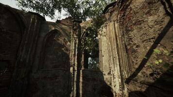 decayed monastery, depicting the ruins of a once majestic building. video