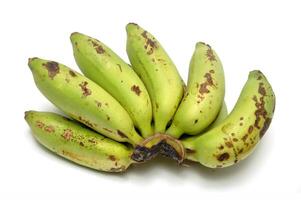 Bananas are half ripe yellowish green white background photo