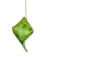 Ketupat a type of dumpling made from rice packed inside photo