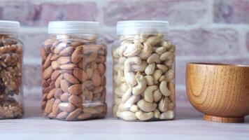 Nuts in jars on a table video