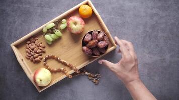 A tray with fruit and nuts on it video