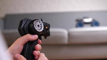 close-up of a radio-controlled remote control for a toy car video