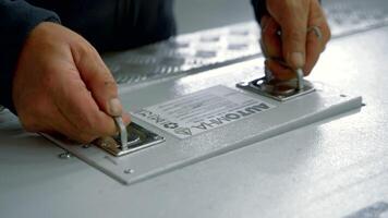 Men's working hands. Creative.Hands taking out a dangerous substance in a specially packed iron closed container video