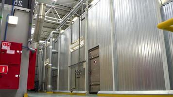 Large isolated room. Scene. A huge empty garage with gray walls. video