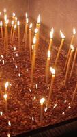 Lighting A Candle With A Match To Get A Romantic Candlelight. Amazing andles and candlesticks are on the table video