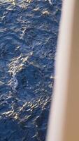 Cruise Ship Deck Railing View. Stock. View of the sea waves from the ship video
