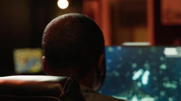 Man shoots asteroids in spaceship flying singleplayer game on gaming PC with overlay HUD showing health, fuel bars. Gamer navigating universe in simulation game, camera A video