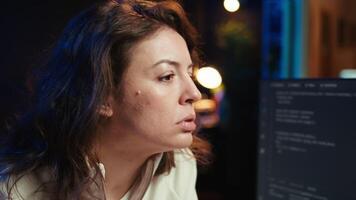 Worried cybersecurity expert pouting after finding many security vulnerabilities, scared of malware infections. Anxious developer distressed by cyber attacks on computer systems, camera B video