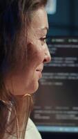 Vertical Delighted programmer celebrating after filtering malicious traffic from cybercriminals attempting to steal company data. Woman excited about accomplishment, preventing malware, camera B video