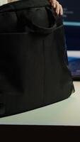 Vertical Teleworking programmer arriving in home office, ready to secure company servers from virus attacks by coding. IT employee starting job shift, building firewalls protecting data from threats, camera A video